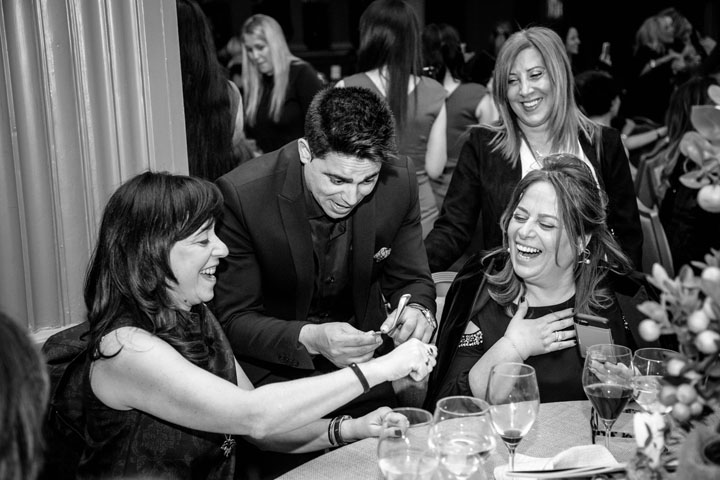Marom Mor performing close-up mentalism at a bat mitzvah celebration