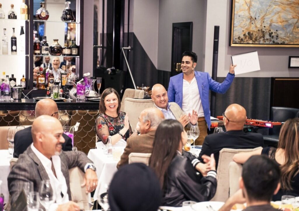 Marom Mor performing close-up mentalism at a private celebration in Palm Beach