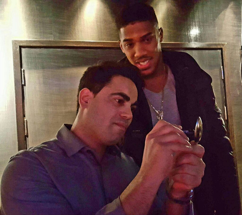 Marom Mor sharing a mentalism moment with Anthony Joshua