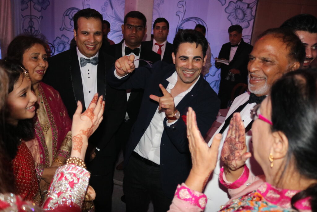 Marom Mor with guests during a close-up performance at Taj Mumbai